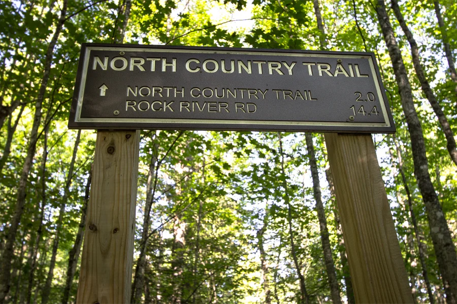 Mileage marker on the North Country Trail as it crosses Michigan's Upper Peninsula. 